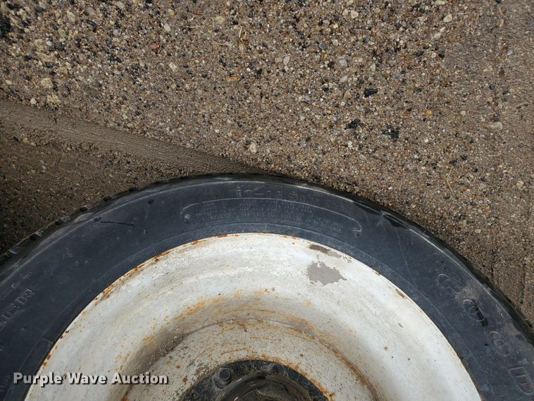 image for item DI5163 1999 International 4700  rollback truck