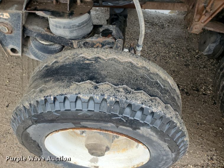 image for item DI5163 1999 International 4700  rollback truck