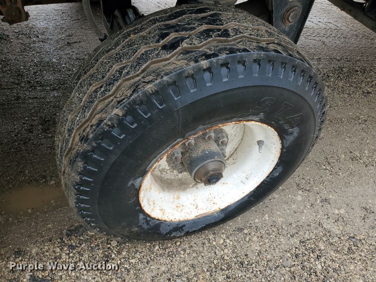 image for item DI5163 1999 International 4700  rollback truck