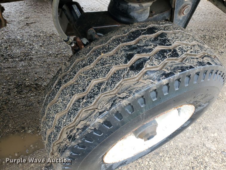 image for item DI5163 1999 International 4700  rollback truck