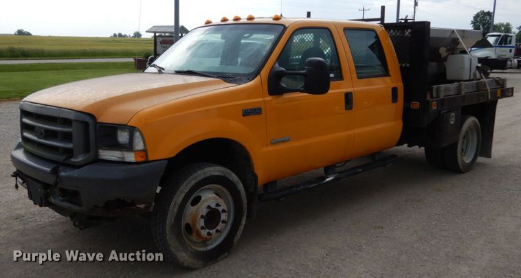 image for item IL9451 2004 Ford F450 Super Duty XL  Crew Cab flatbed truck