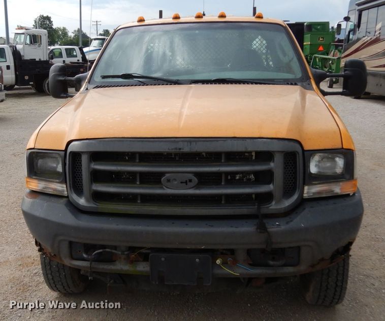 image for item IL9451 2004 Ford F450 Super Duty XL  Crew Cab flatbed truck