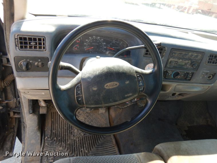 image for item IL9755 2001 Ford F350 Super Duty  flatbed pickup truck