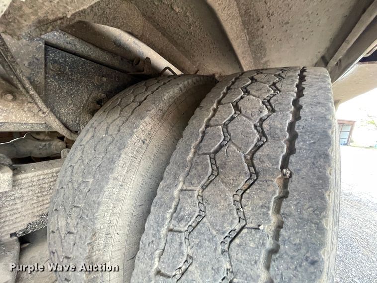 image for item IR9863 2005 Sterling L-Line  roll-off container truck