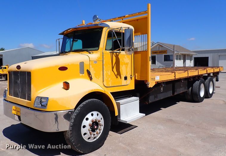 image for item DL7529 2003 Peterbilt 330  dump flatbed truck