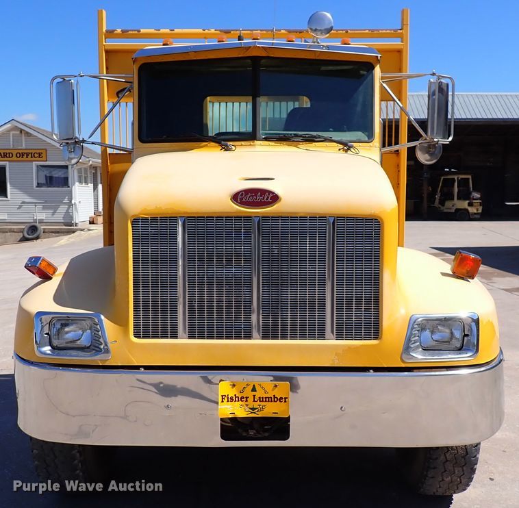 image for item DL7529 2003 Peterbilt 330  dump flatbed truck