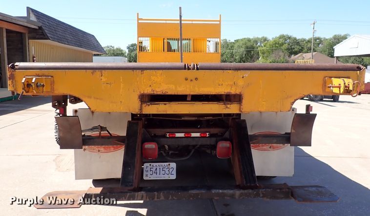 image for item DL7529 2003 Peterbilt 330  dump flatbed truck