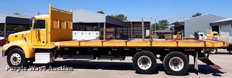 image for item DL7529 2003 Peterbilt 330  dump flatbed truck