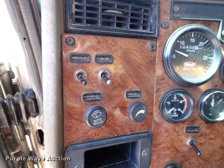 image for item DL7529 2003 Peterbilt 330  dump flatbed truck