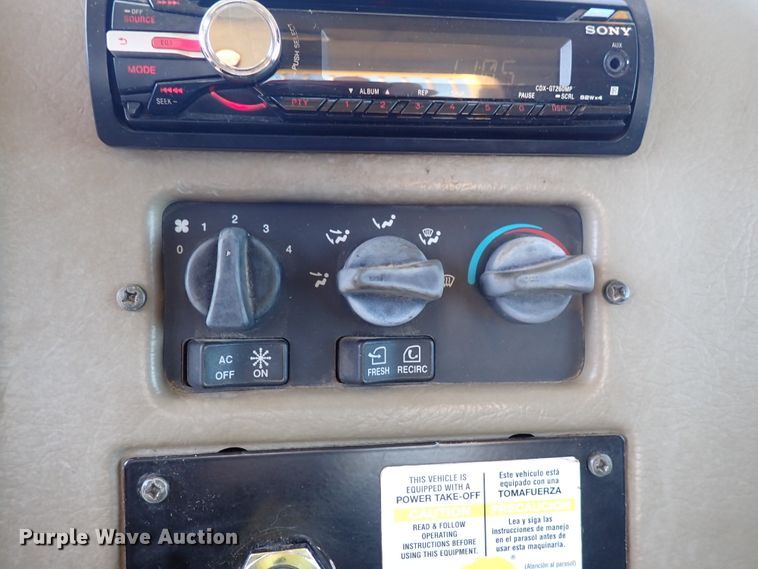 image for item DL7529 2003 Peterbilt 330  dump flatbed truck