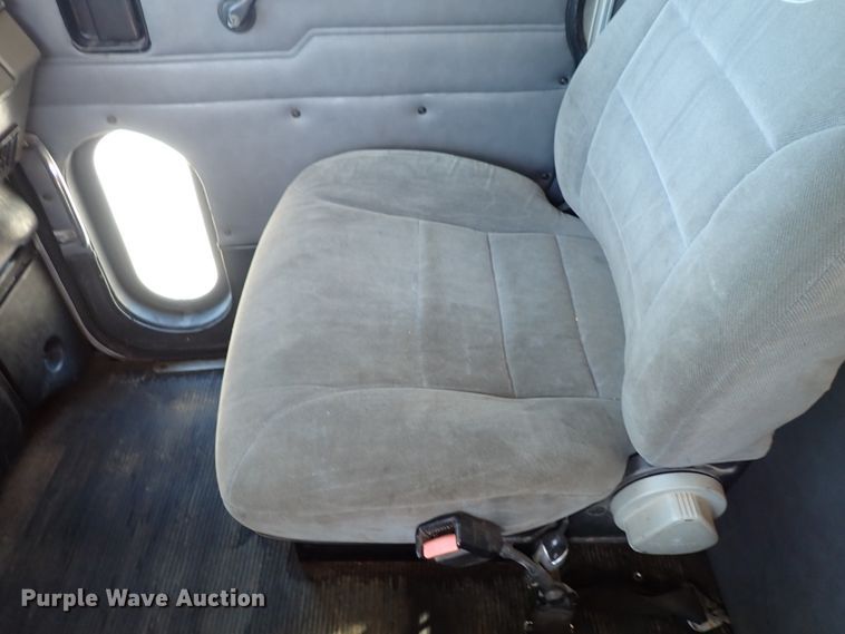 image for item DL7529 2003 Peterbilt 330  dump flatbed truck