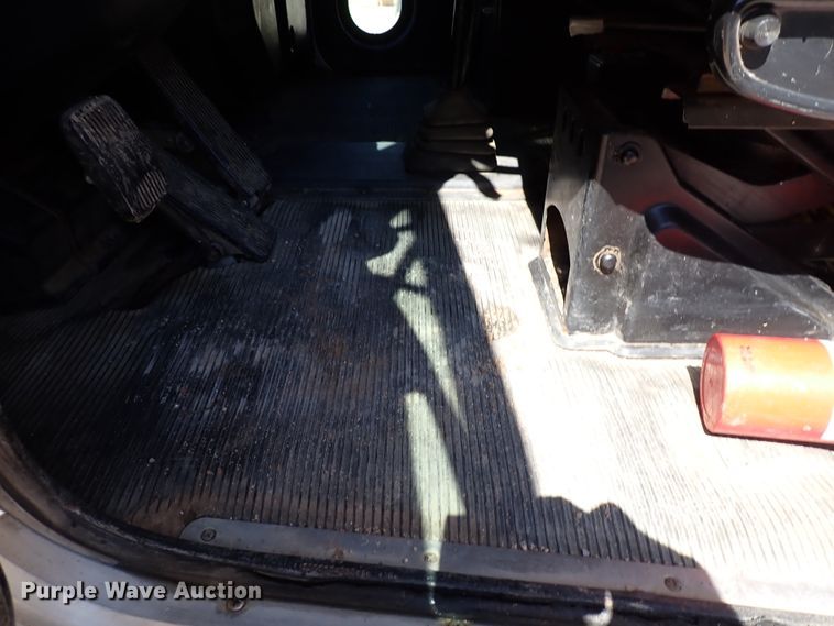 image for item DL7529 2003 Peterbilt 330  dump flatbed truck