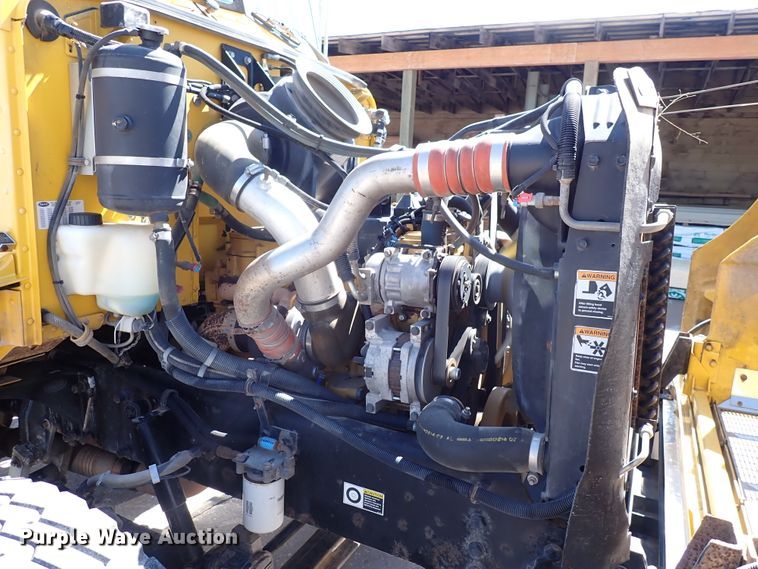 image for item DL7529 2003 Peterbilt 330  dump flatbed truck