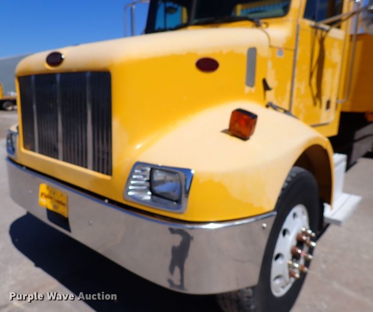 image for item DL7529 2003 Peterbilt 330  dump flatbed truck