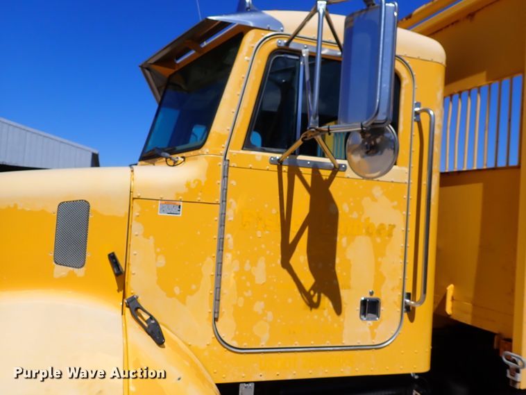 image for item DL7529 2003 Peterbilt 330  dump flatbed truck