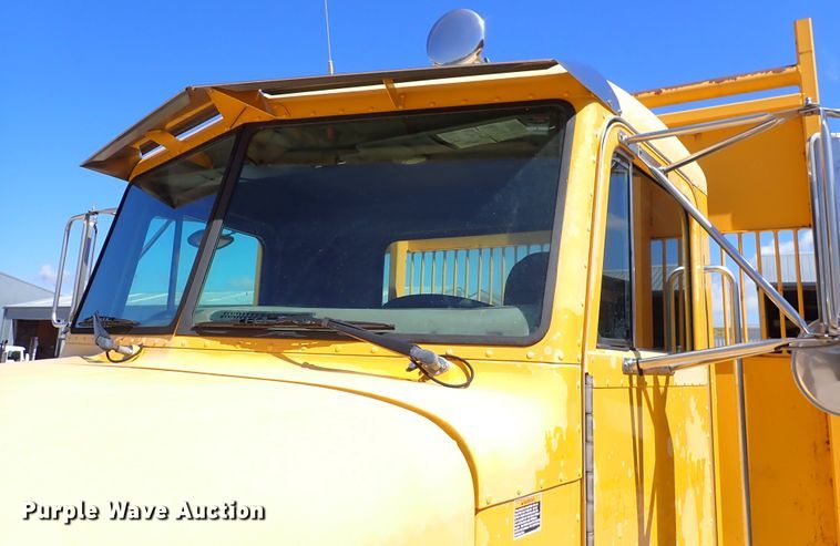 image for item DL7529 2003 Peterbilt 330  dump flatbed truck