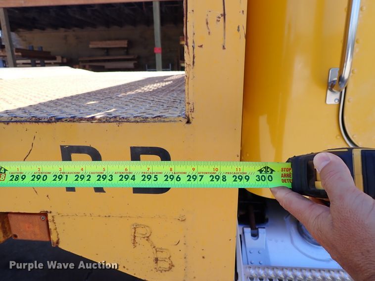 image for item DL7529 2003 Peterbilt 330  dump flatbed truck