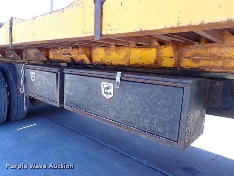 image for item DL7529 2003 Peterbilt 330  dump flatbed truck