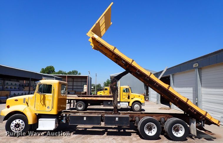image for item DL7529 2003 Peterbilt 330  dump flatbed truck