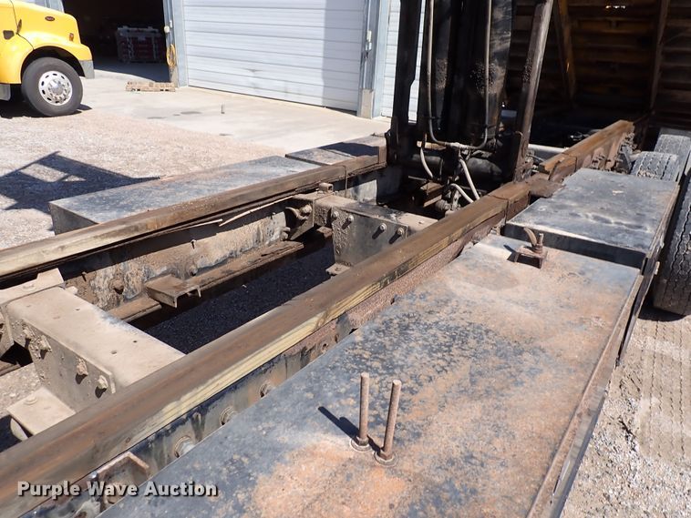 image for item DL7529 2003 Peterbilt 330  dump flatbed truck