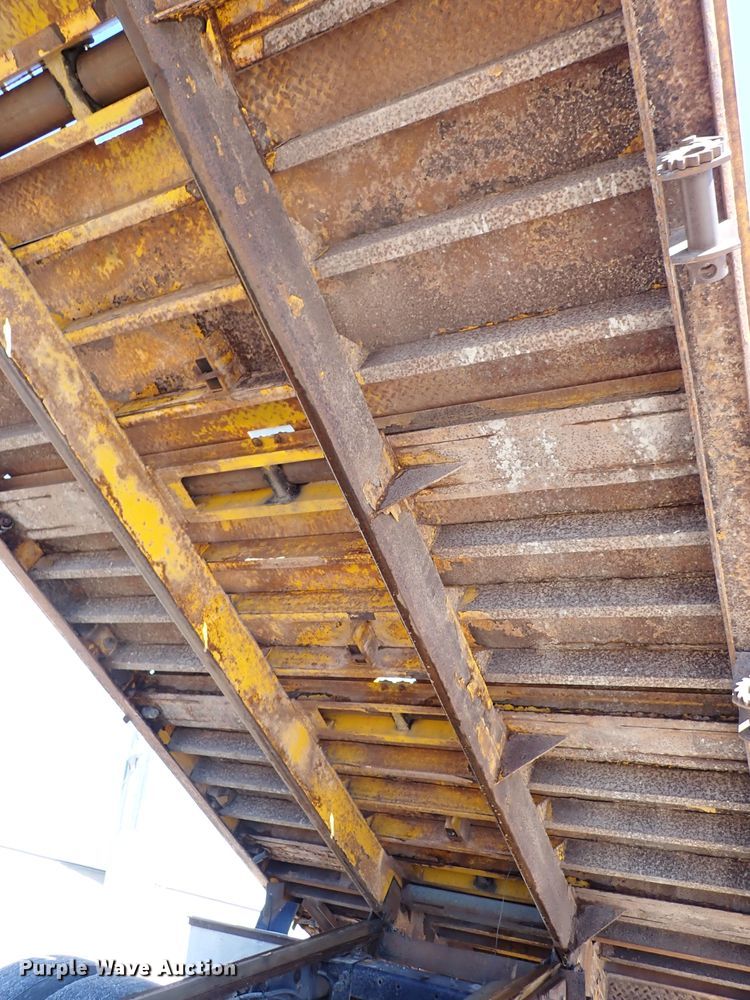 image for item DL7529 2003 Peterbilt 330  dump flatbed truck