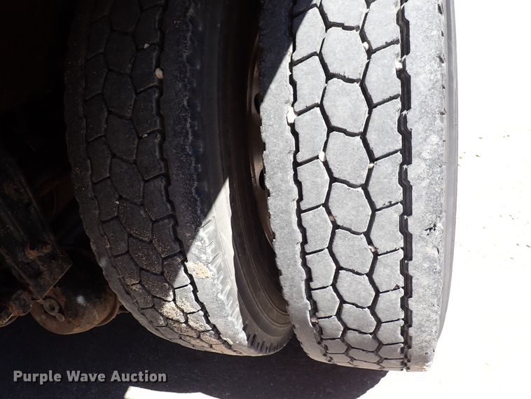 image for item DL7529 2003 Peterbilt 330  dump flatbed truck