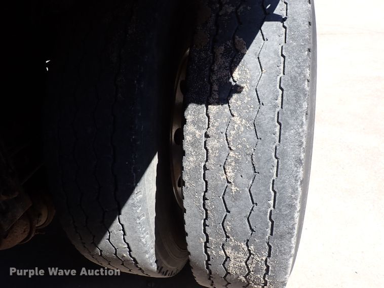 image for item DL7529 2003 Peterbilt 330  dump flatbed truck