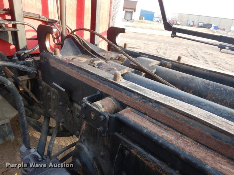 image for item HE9570 2000 Peterbilt 330  roll-off container truck