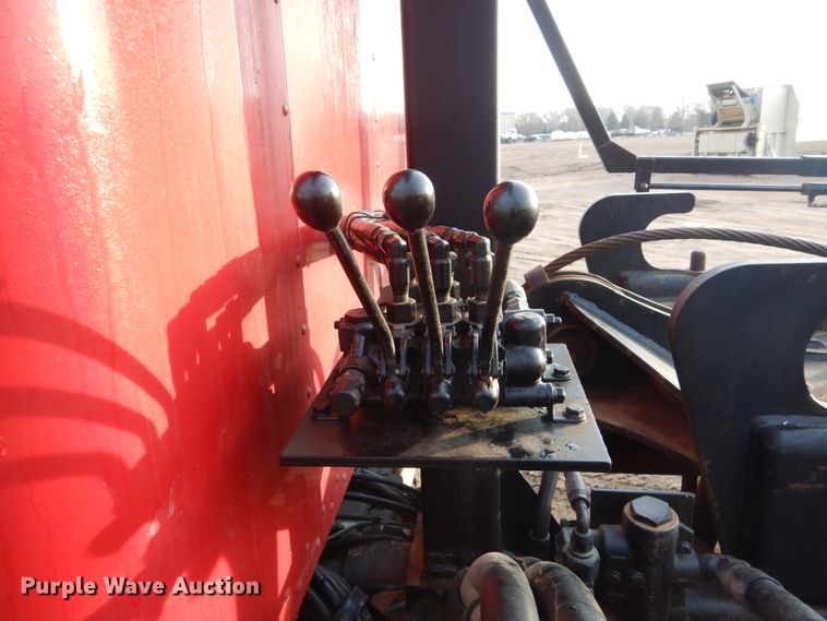 image for item HE9570 2000 Peterbilt 330  roll-off container truck