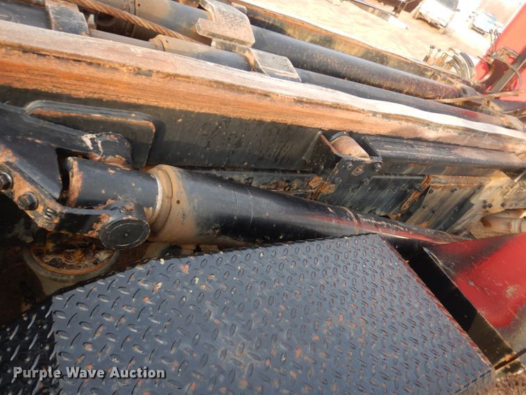 image for item HE9570 2000 Peterbilt 330  roll-off container truck