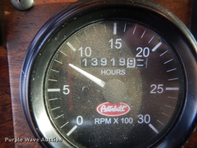 image for item HE9570 2000 Peterbilt 330  roll-off container truck