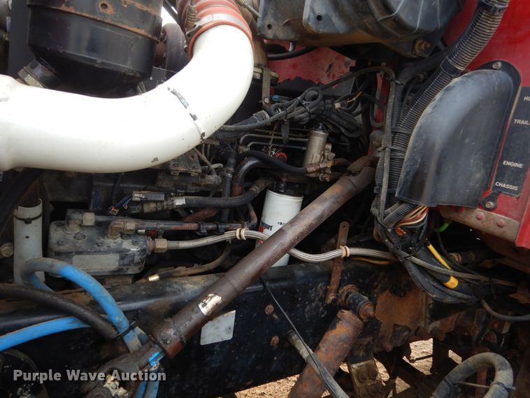 image for item HE9570 2000 Peterbilt 330  roll-off container truck