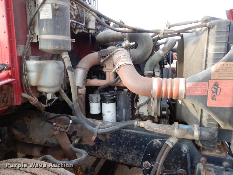 image for item HE9570 2000 Peterbilt 330  roll-off container truck