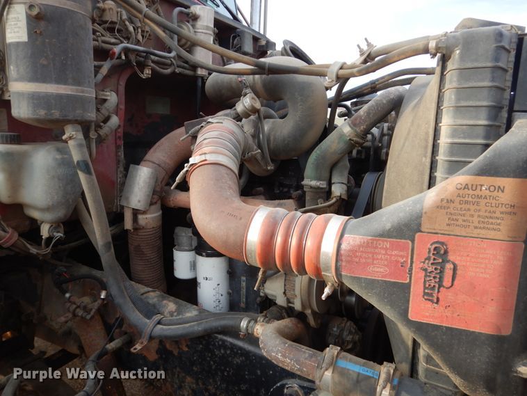 image for item HE9570 2000 Peterbilt 330  roll-off container truck