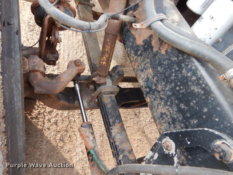 image for item HE9570 2000 Peterbilt 330  roll-off container truck