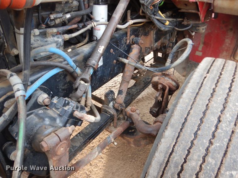 image for item HE9570 2000 Peterbilt 330  roll-off container truck