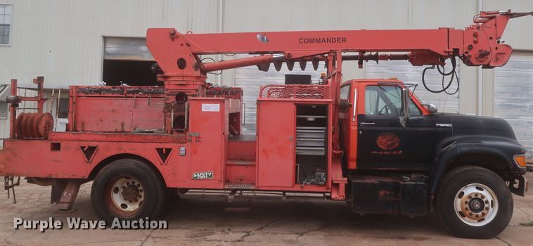 image for item IP9873 1998 Ford F800  digger derrick truck