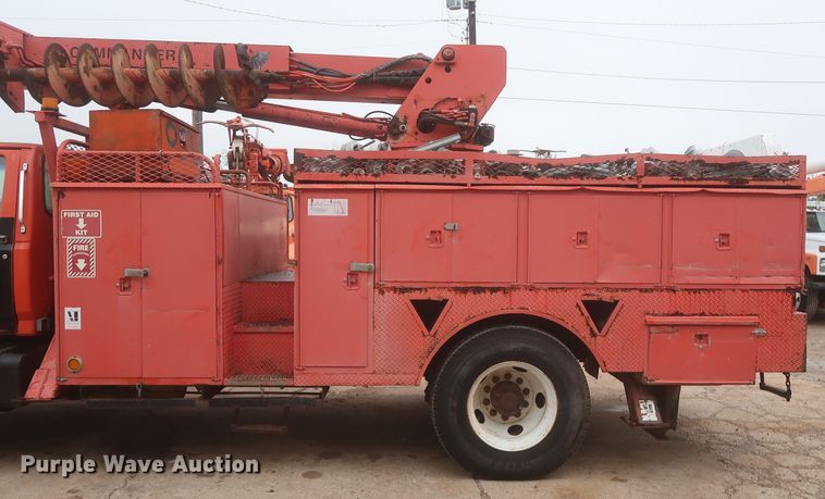 image for item IP9873 1998 Ford F800  digger derrick truck