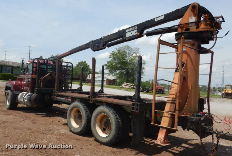 image for item IQ9512 1997 Mack RD688S  log loader truck