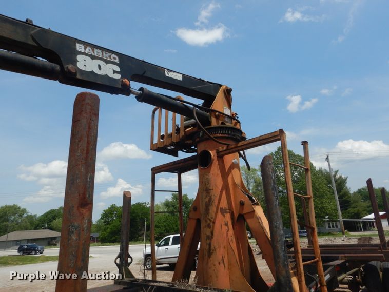 image for item IQ9512 1997 Mack RD688S  log loader truck