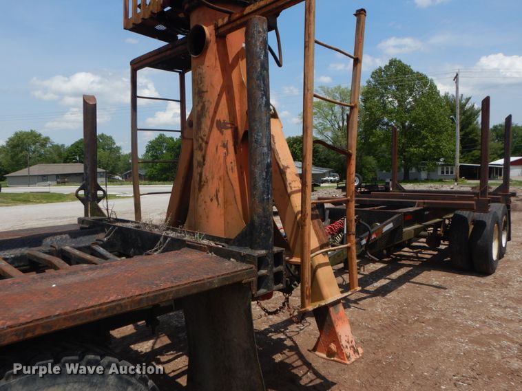 image for item IQ9512 1997 Mack RD688S  log loader truck