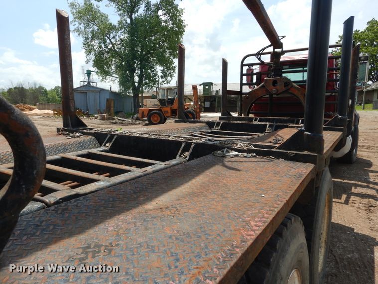 image for item IQ9512 1997 Mack RD688S  log loader truck