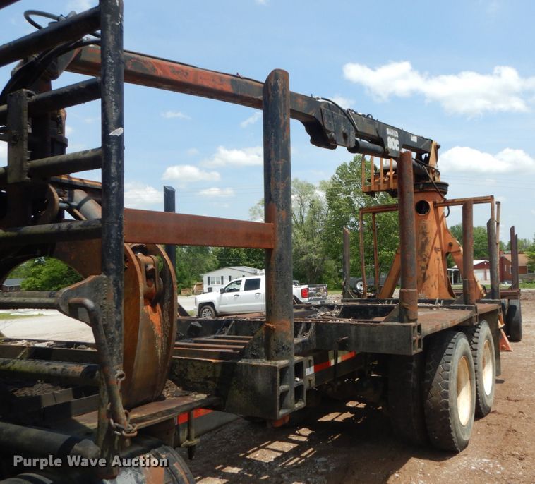 image for item IQ9512 1997 Mack RD688S  log loader truck