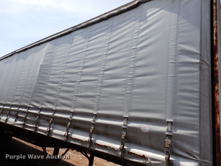 image for item IQ9521 1983 Utility FS2CH  side curtain trailer