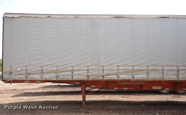 image for item IQ9521 1983 Utility FS2CH  side curtain trailer