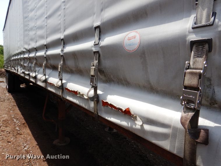 image for item IQ9521 1983 Utility FS2CH  side curtain trailer