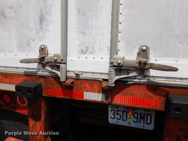 image for item IQ9521 1983 Utility FS2CH  side curtain trailer