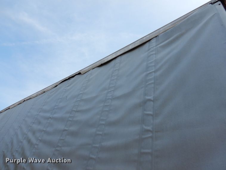 image for item IQ9521 1983 Utility FS2CH  side curtain trailer