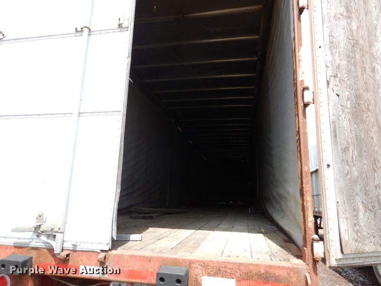 image for item IQ9521 1983 Utility FS2CH  side curtain trailer