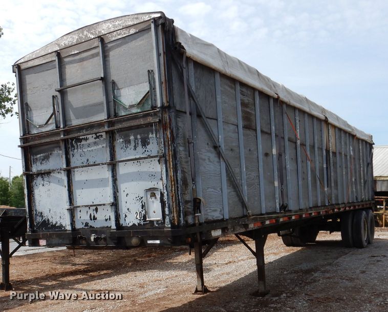 image for item IQ9525 1975 Delta  flatbed trailer